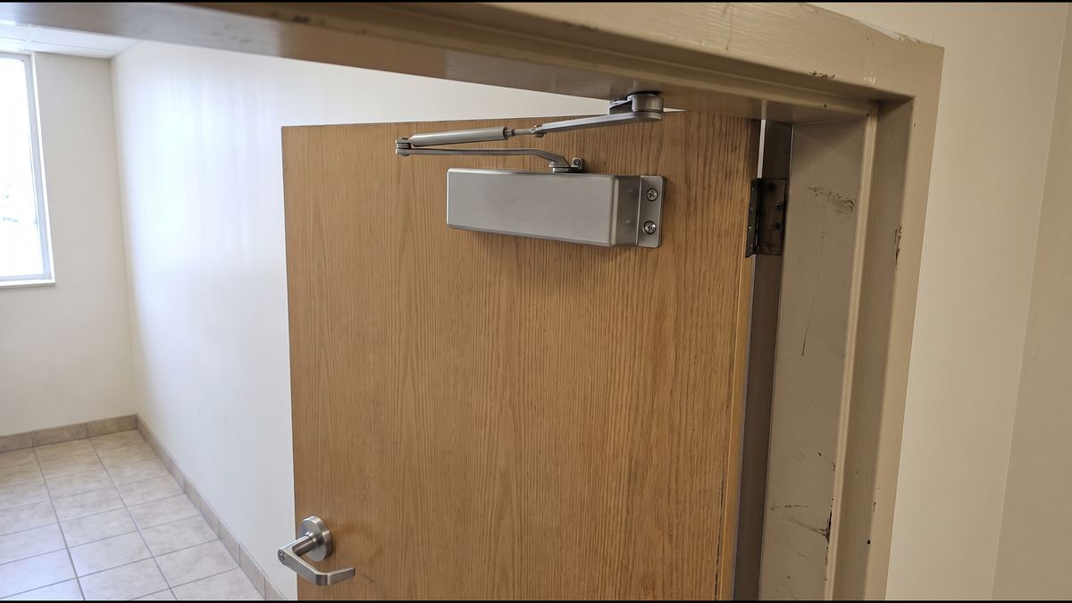Door closer repair: after, same material repaired