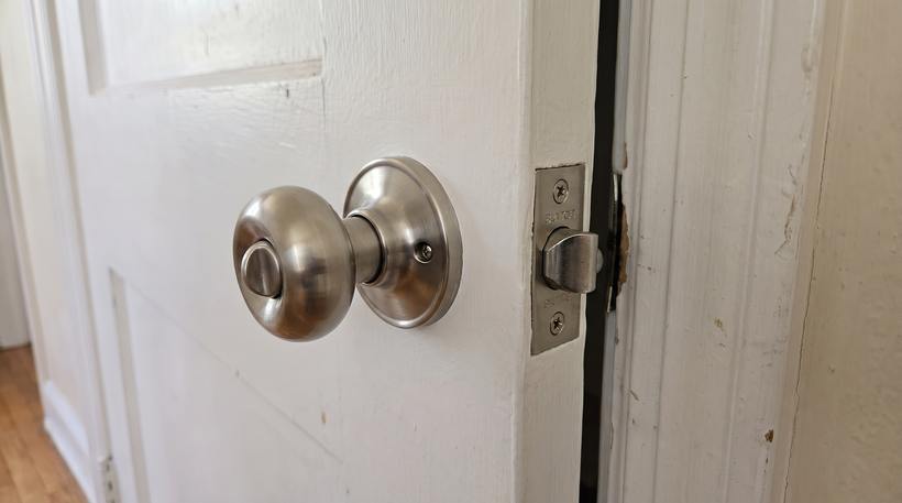 The same door with a new deadbolt and handle set fitted