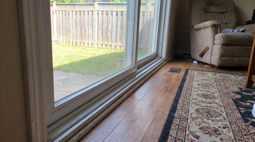 The same sliding door gliding on new rollers in a clean track