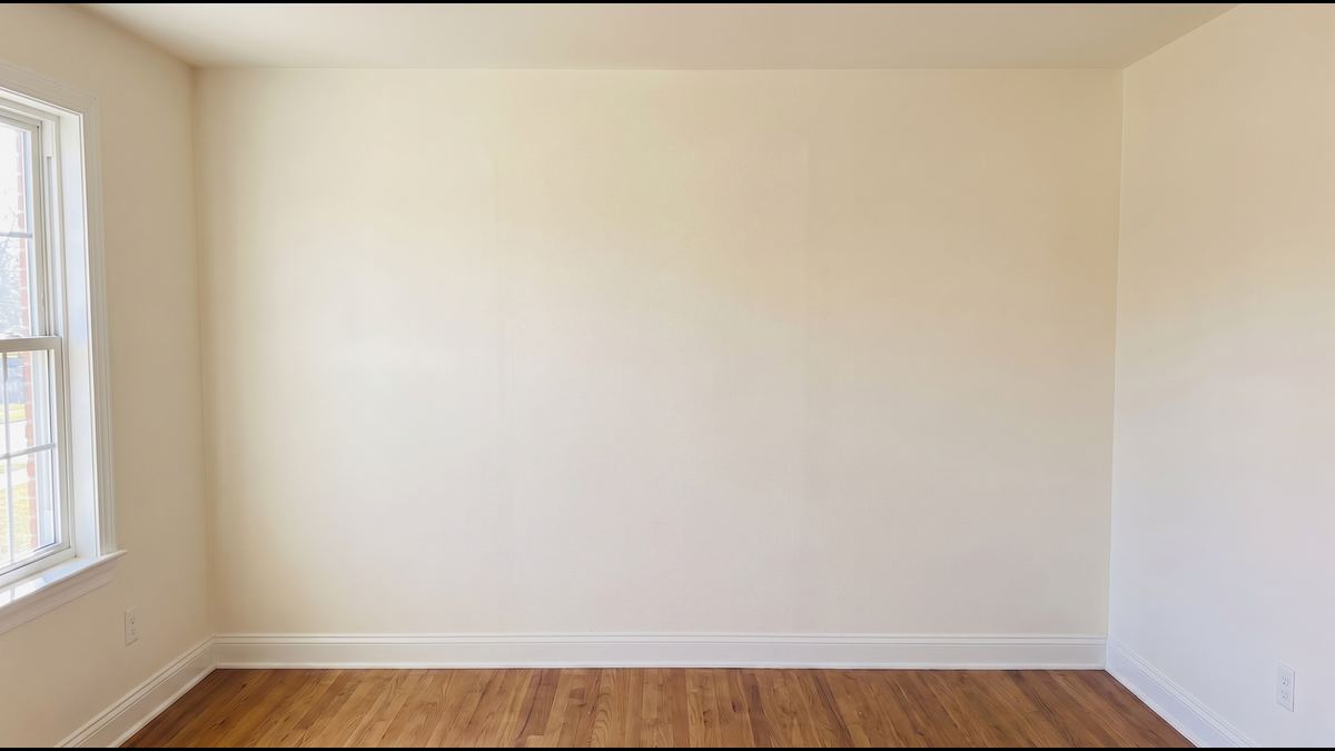 The same wall with a new sheet hung, finished, textured and primed