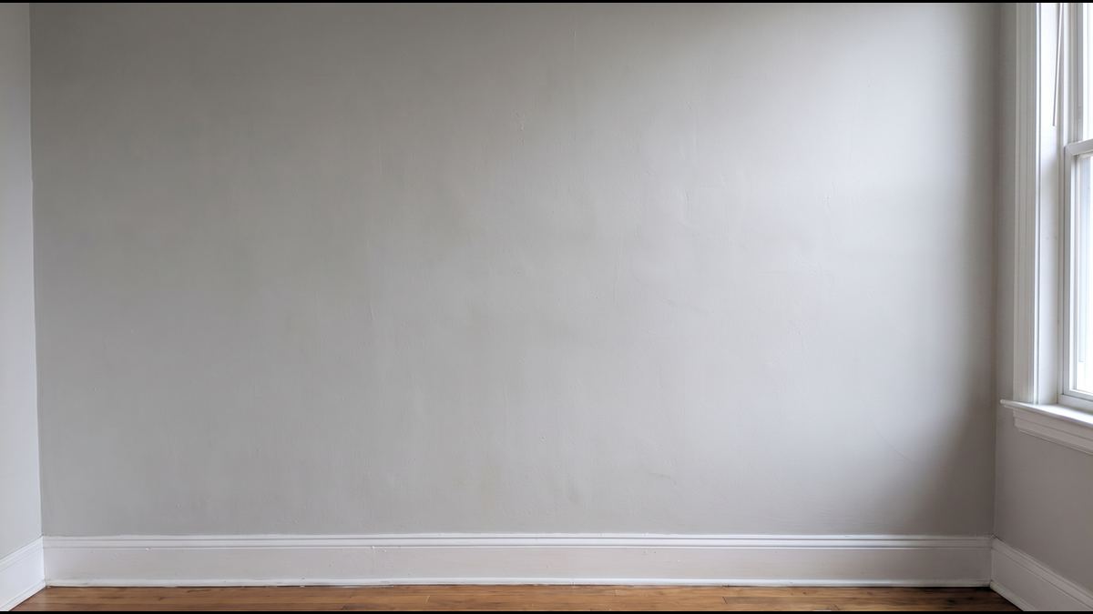 The same wall with every hole filled, textured and primed, clean