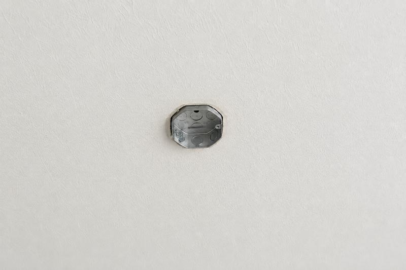 Open ceiling junction box before the fan installation