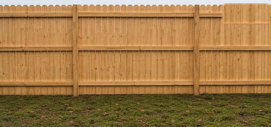 The same fence line rebuilt and standing