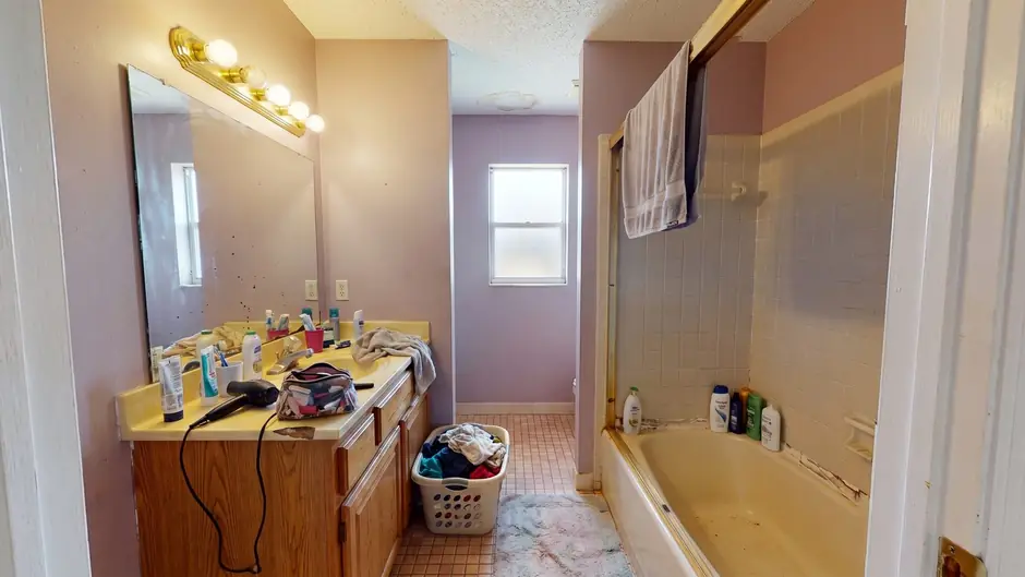 Before: a dated bathroom