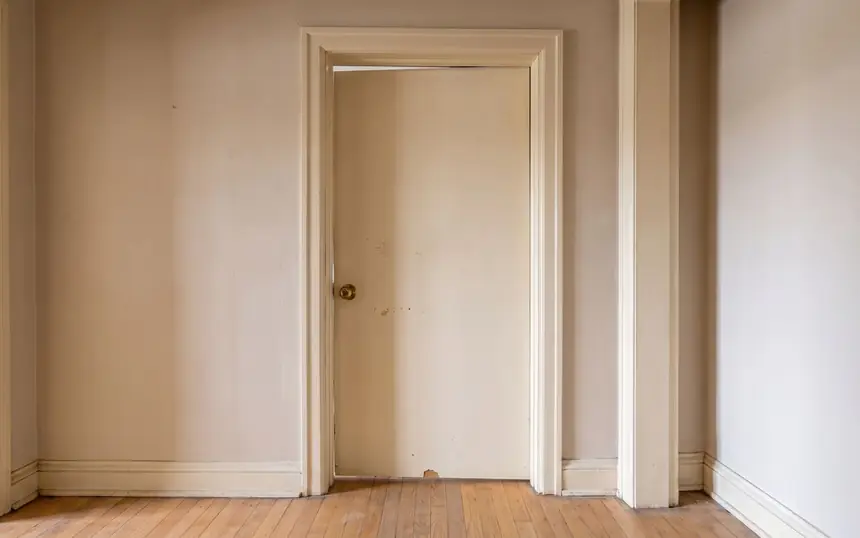 Before: an empty doorway with no door
