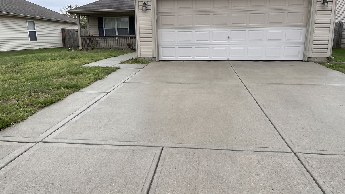 Same driveway and walkway power washed clean