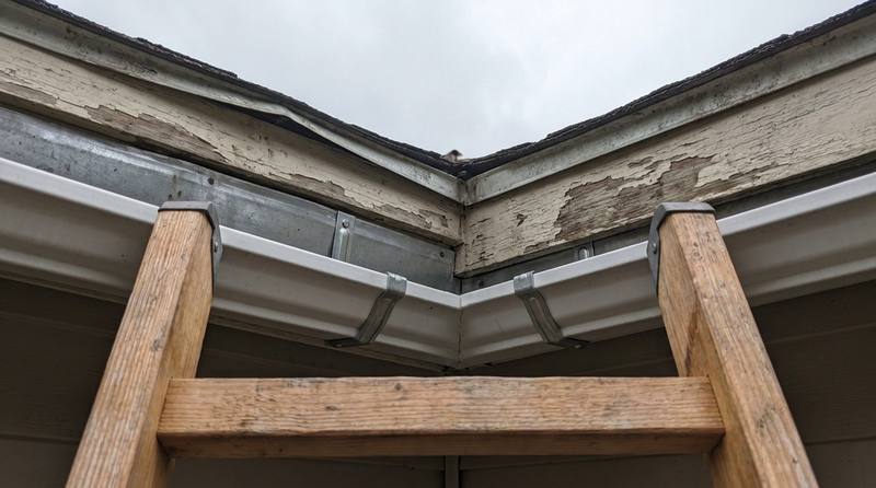 The same gutter cleaned, re-secured and flowing free