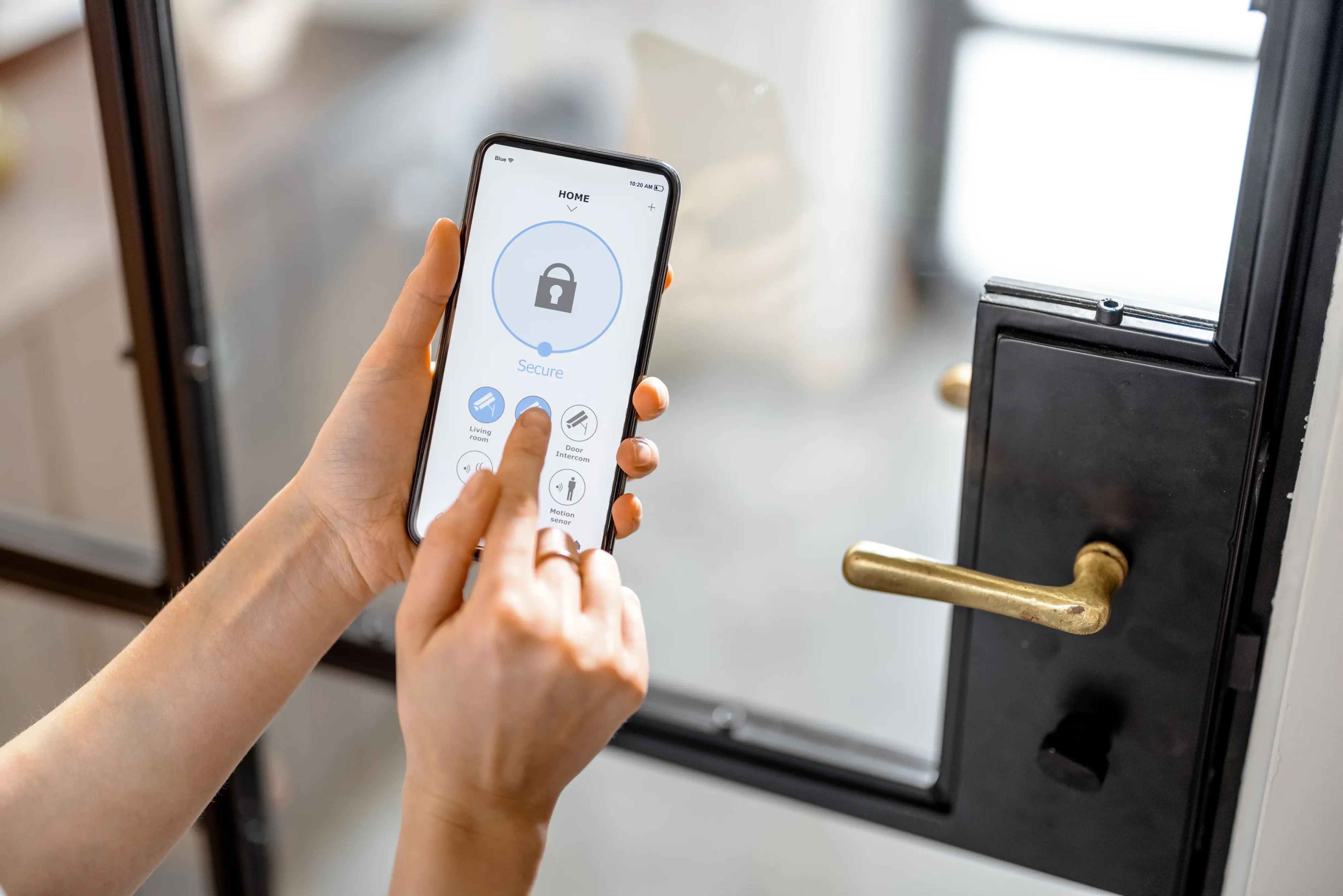 Technician installing and pairing a smart lock on a home's front door